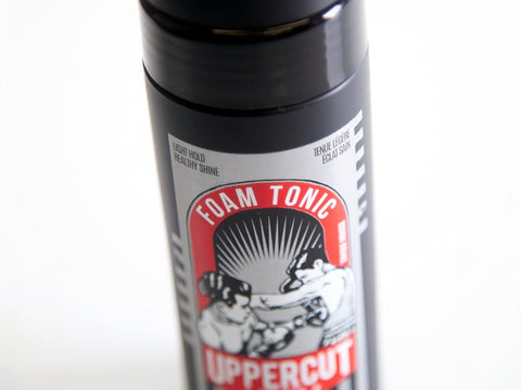 Uppercut Deluxe Foam Tonic 150ml front view of lightweight styling foam bottle with branding