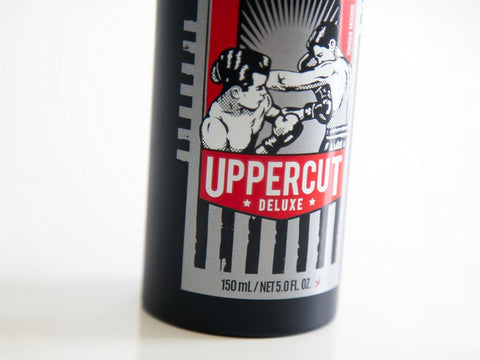 Uppercut Deluxe Foam Tonic 150ml front view of lightweight styling foam bottle with branding
