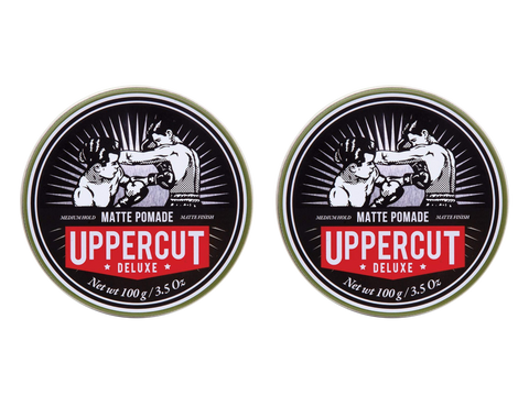 Uppercut Deluxe Matte Pomade 100g texture close up on finger showing medium hold matte finish styling product 2 packs
