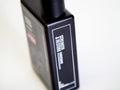 Uppercut Deluxe Strength and Restore Conditioner 240ml bottle angled view showing 240ml size