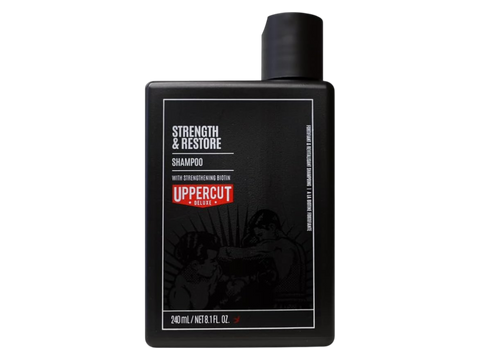 Uppercut Deluxe Strength and Restore Shampoo 240ml front view of shampoo bottle with branding