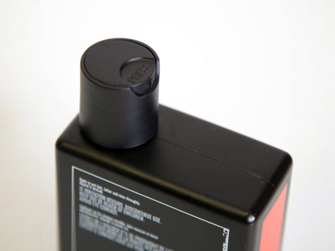 Uppercut Deluxe Strength and Restore Shampoo 240ml bottle angled view showing 240ml size