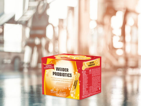 Front: Weider Microbiotics Immune Support probiotic box with 60 single-dose sachets, orange flavour, on white background.